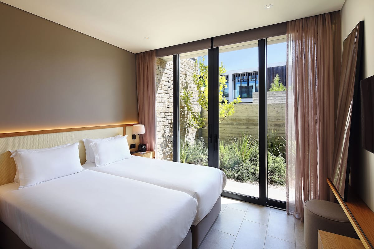 Hypo-allergenic bedding available, memory foam beds, in-room safe