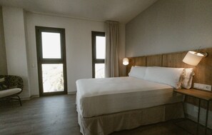 Ropa de cama de alta calidad y minibar 