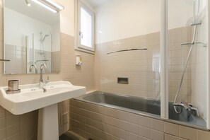 Bathtub, hair dryer