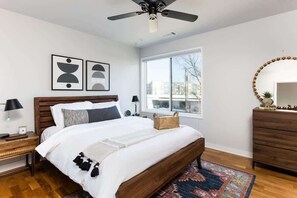 1 bedroom, desk, iron/ironing board, travel crib