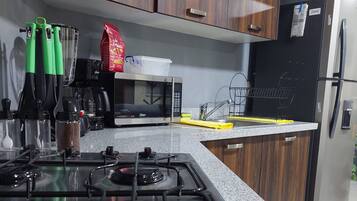 Fridge, microwave, coffee/tea maker, electric kettle