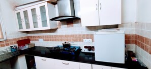 Fridge, microwave, electric kettle, toaster