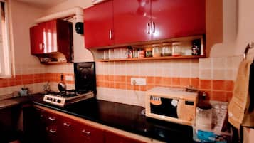 Fridge, microwave, electric kettle, toaster