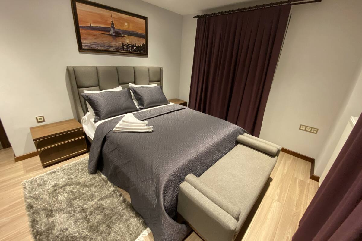 Deluxe Condo | Premium bedding, Select Comfort beds, desk, blackout drapes