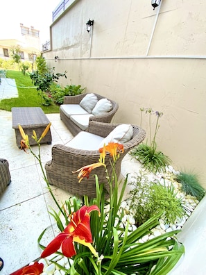 Family Condo | Living area | 70-cm LCD TV with satellite channels