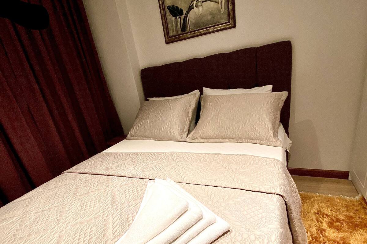 Premium bedding, Select Comfort beds, desk, blackout drapes