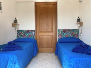 2 quartos, ferros/tábuas de passar roupa