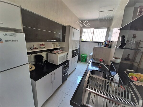 Fridge, microwave, coffee/tea maker, dining tables
