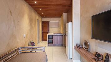 Comfort Studio Suite | Living area | 43-inch Smart TV with satellite channels