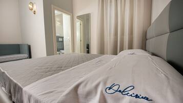 Doppia Exclusive | Biancheria da letto di alta qualità, materassi in memory foam, minibar