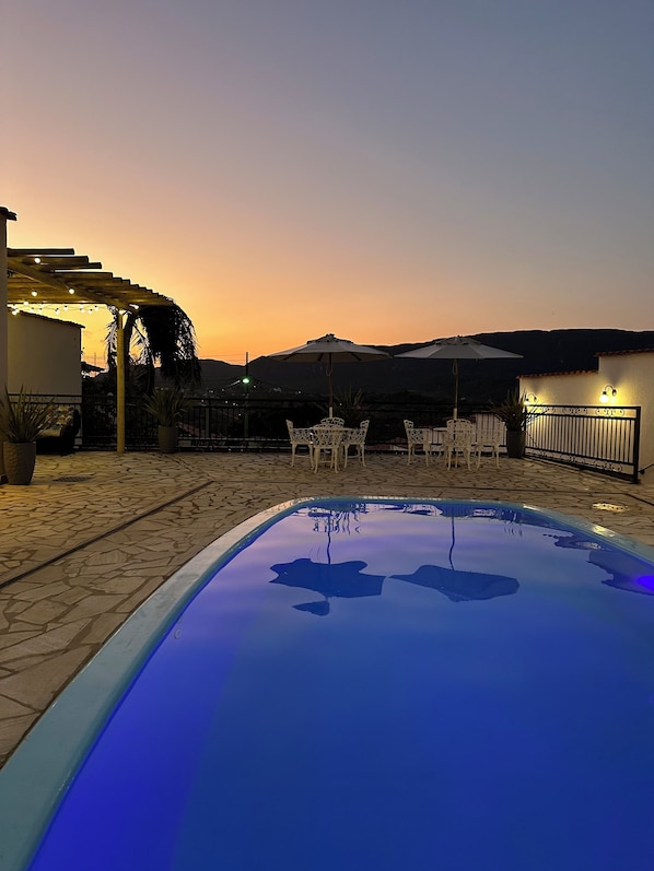 Outdoor pool, pool umbrellas, pool loungers