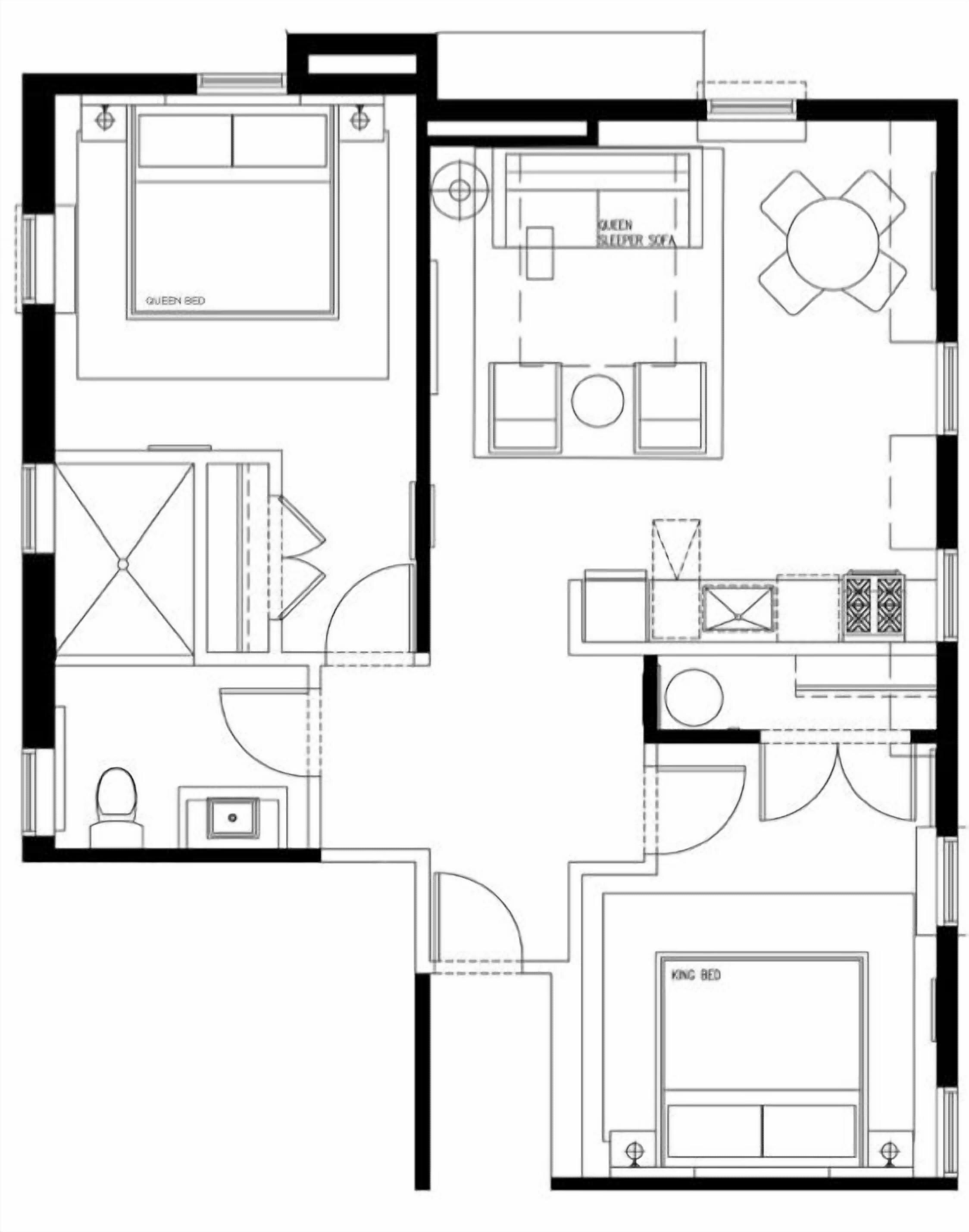 A floor plan with a queen bed, king bed, a dining area, and a bathroom.