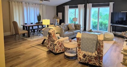 We are a quiet ranch home that sits on 8 acres with firepit, pond and bar.
