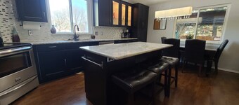 Relax in the Hot Tub, Sleep in Comfort on a King Bed, Play Pool, Charge Your EV