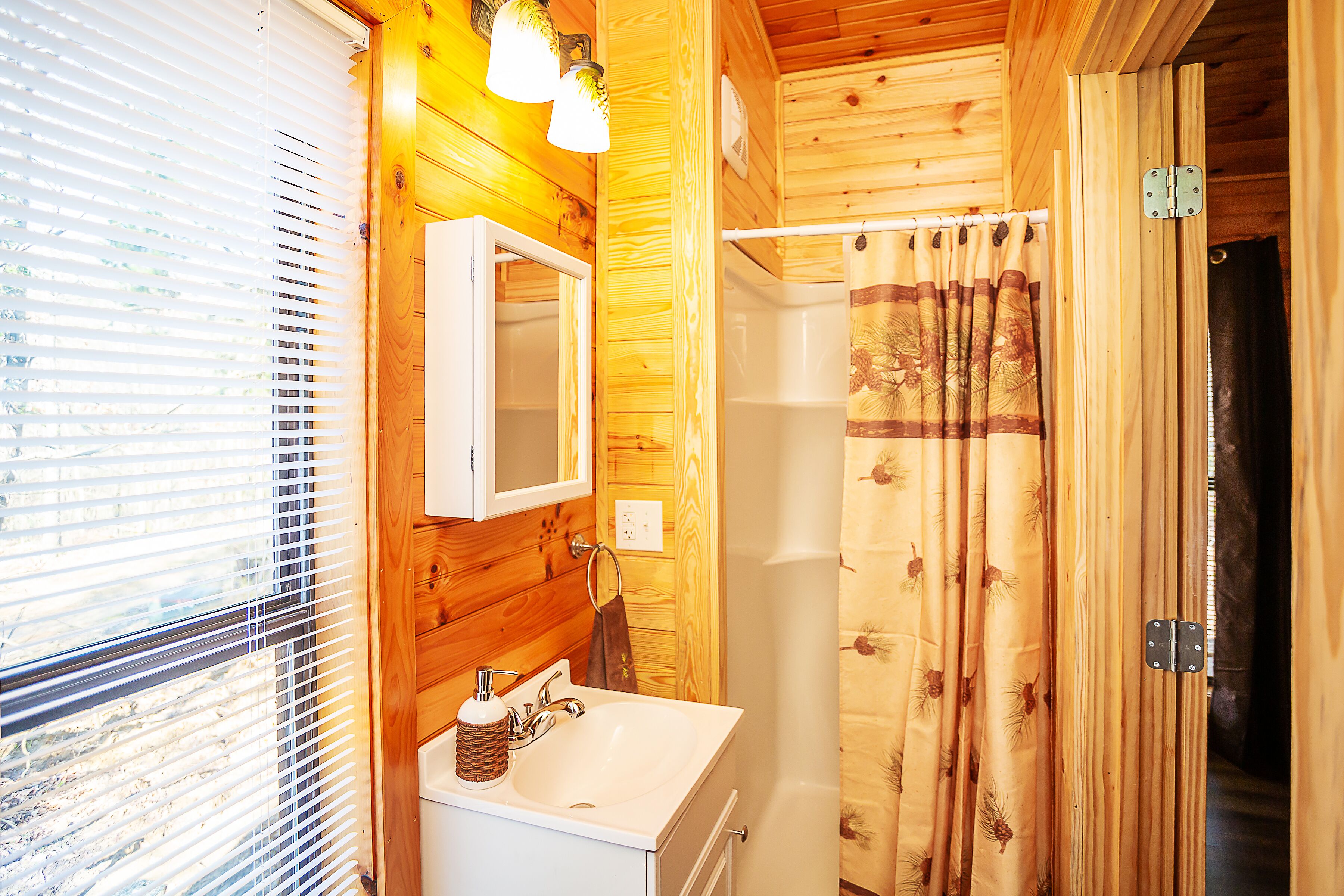 Bigfoot Lodge Room One | Bathroom | Shower, towels