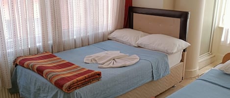 Shower, rainfall showerhead, bathrobes, towels