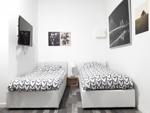 1 chambre, fer et planche à repasser, accès au Wi-Fi (inclus)