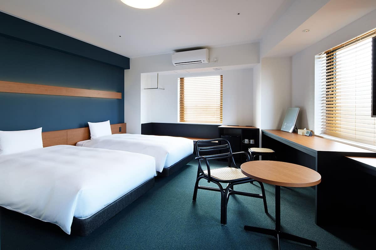 Deluxe-Zweibettzimmer | Daunenbettdecken, Verdunkelungsvorhänge, kostenloses WLAN, Bettwäsche