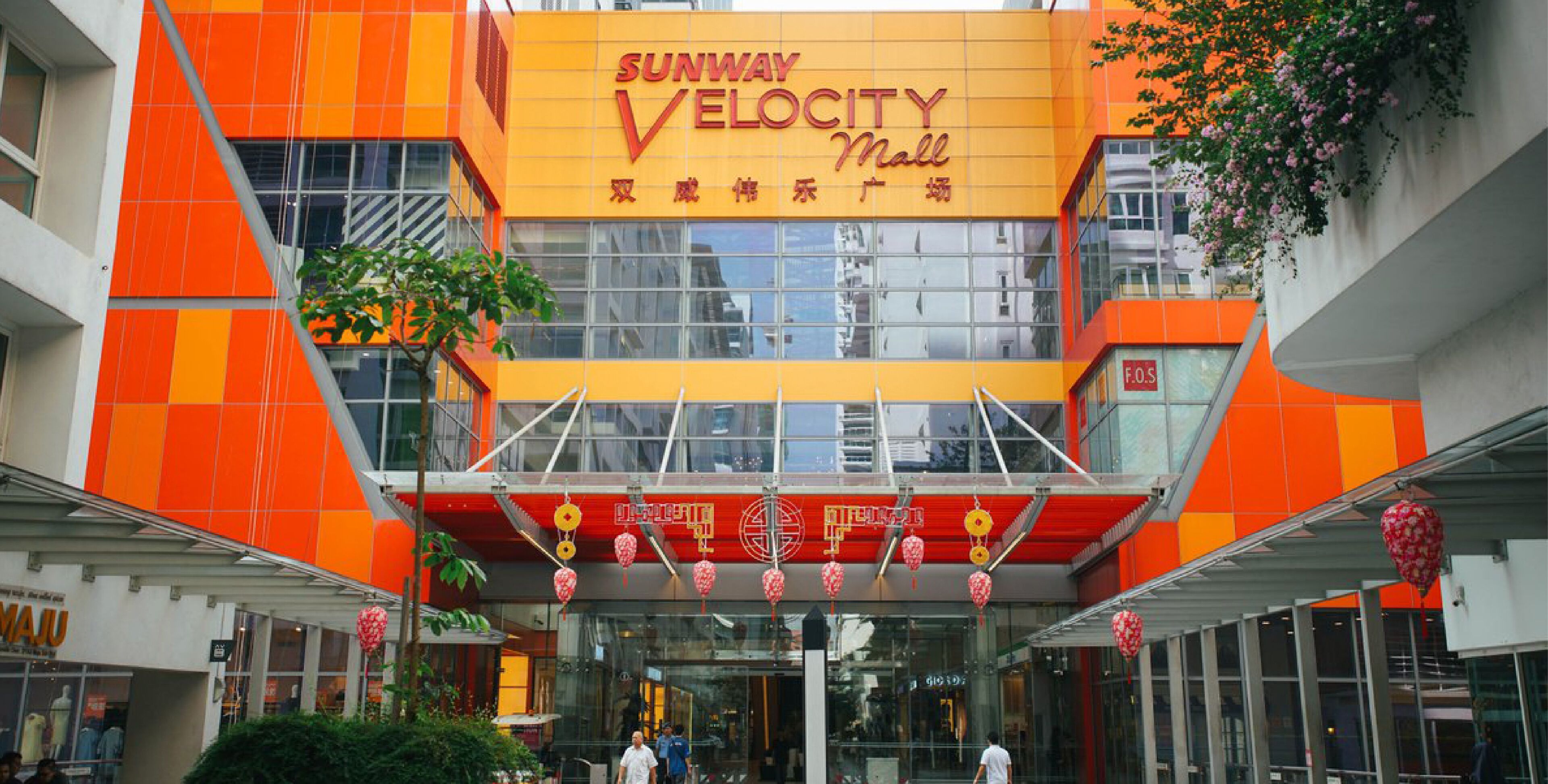 A modern building with a prominent sign reading "SUNWAY VELOCITY Mall".