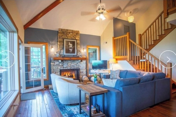 Cozy living area with beautiful views, access to the deck and gas fireplace