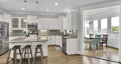 Waterfront; Golf Cart option; hot tub; Kayaks; Peddle Boat; Walk to beach; Ramp