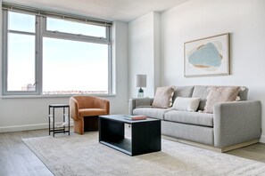 TV, stereo - Upscale Cambridge 1BR w/ Gym & W/D, walk to Harvard Bridge, by Blueground (Cambridge)