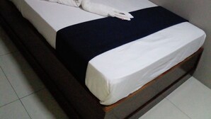 مكواة/لوح كي وملاءات أسرّة