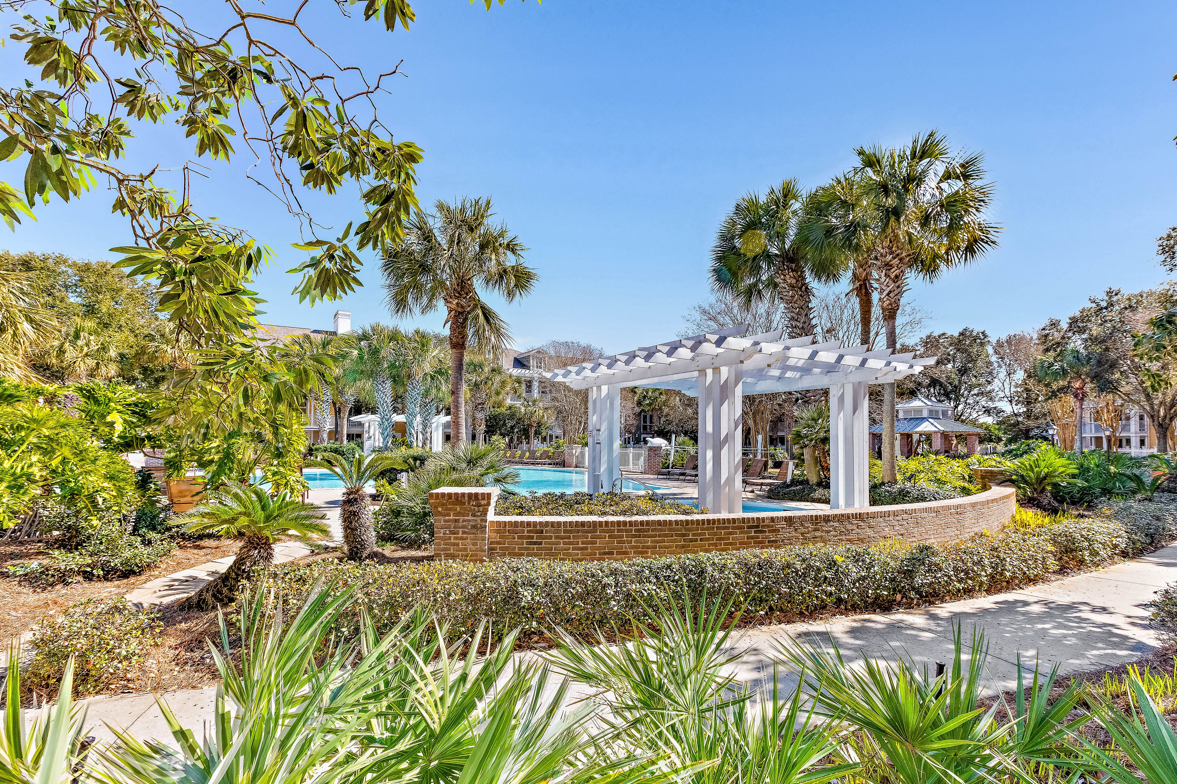 Bright & beachy condo with pool, hot tub + nearby beach access