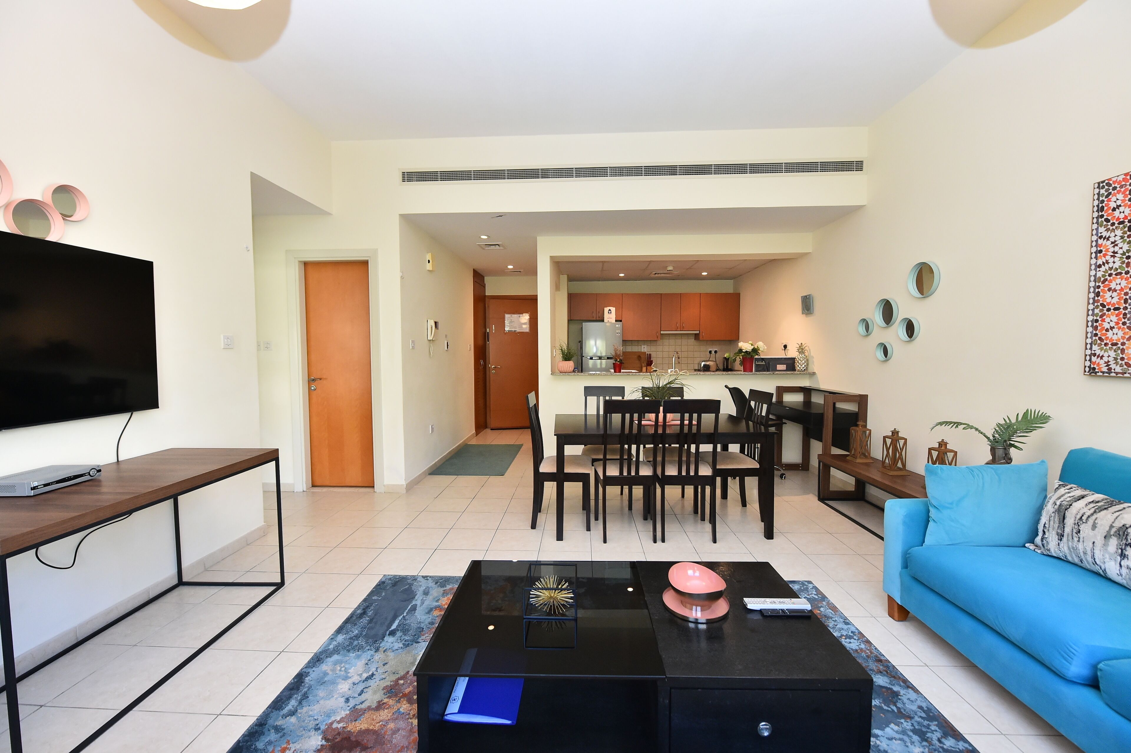 Apartamento | Área de estar | Smart TV 42 polegadas com canais a cabo, TV