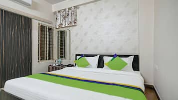 Economy Room | Desk, iron/ironing board