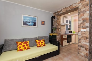 Apartment (Two Bedroom Apartment with Loggia and) | Living room | 25-inch TV with cable channels