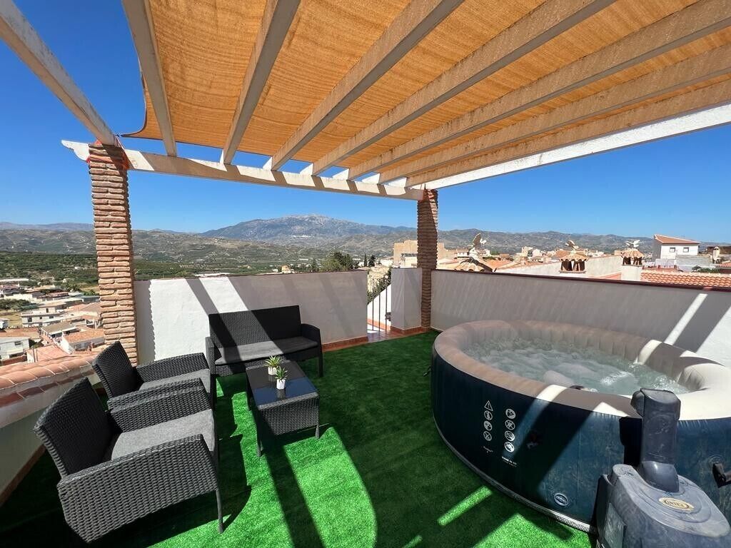 Bañera de hidromasaje al aire libre