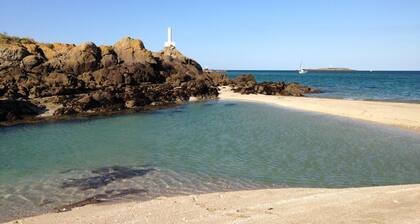 Vacances dans un cottage chaleureux entre terre et mer