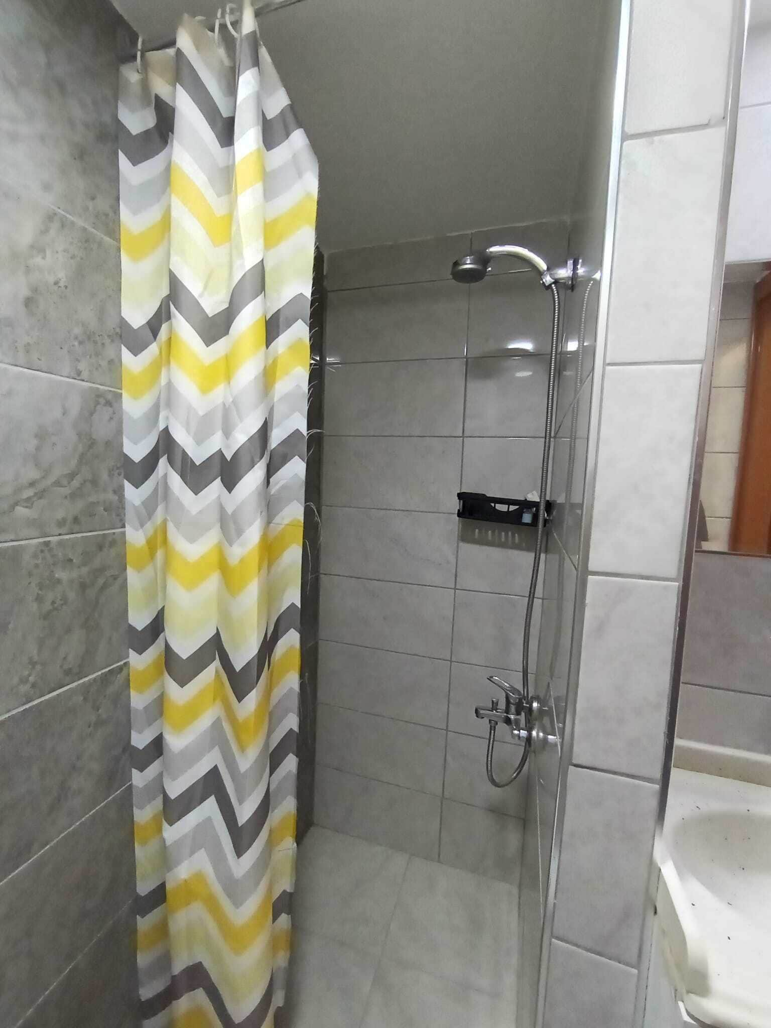 shower, rainfall showerhead, hair dryer, towels