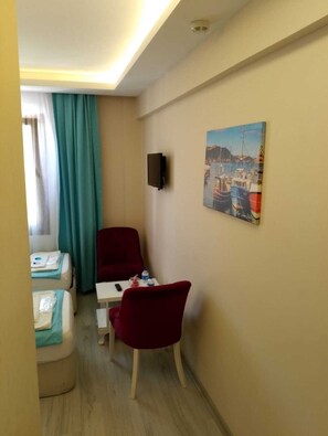 Premium bedding, minibar, desk, laptop workspace