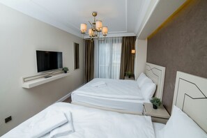 Deluxe-Dreibettzimmer | Bettwäsche aus ägyptischer Baumwolle, hochwertige Bettwaren