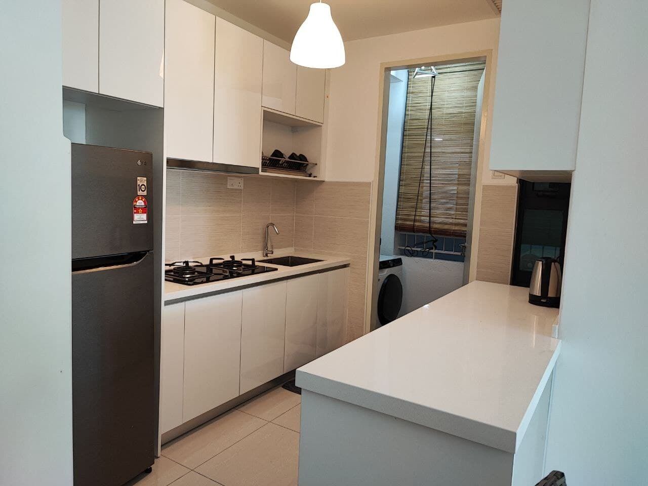 Fridge, electric kettle, cookware/dishes/utensils, spices