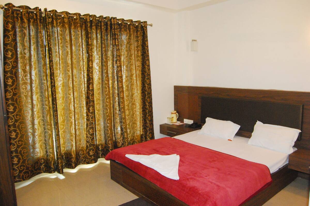 Egyptian cotton sheets, premium bedding, down duvets, memory-foam beds