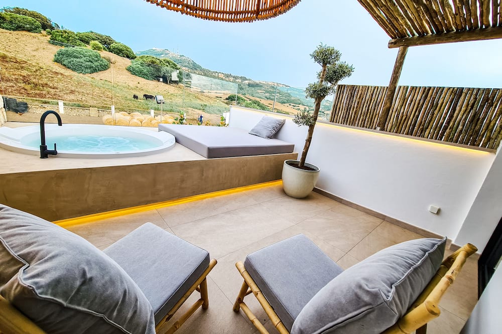S Estancia Suites