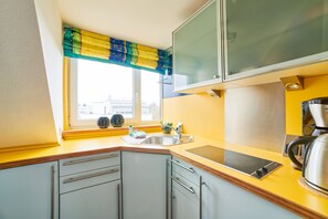 Kylskåp, ugn, spishäll och diskmaskin