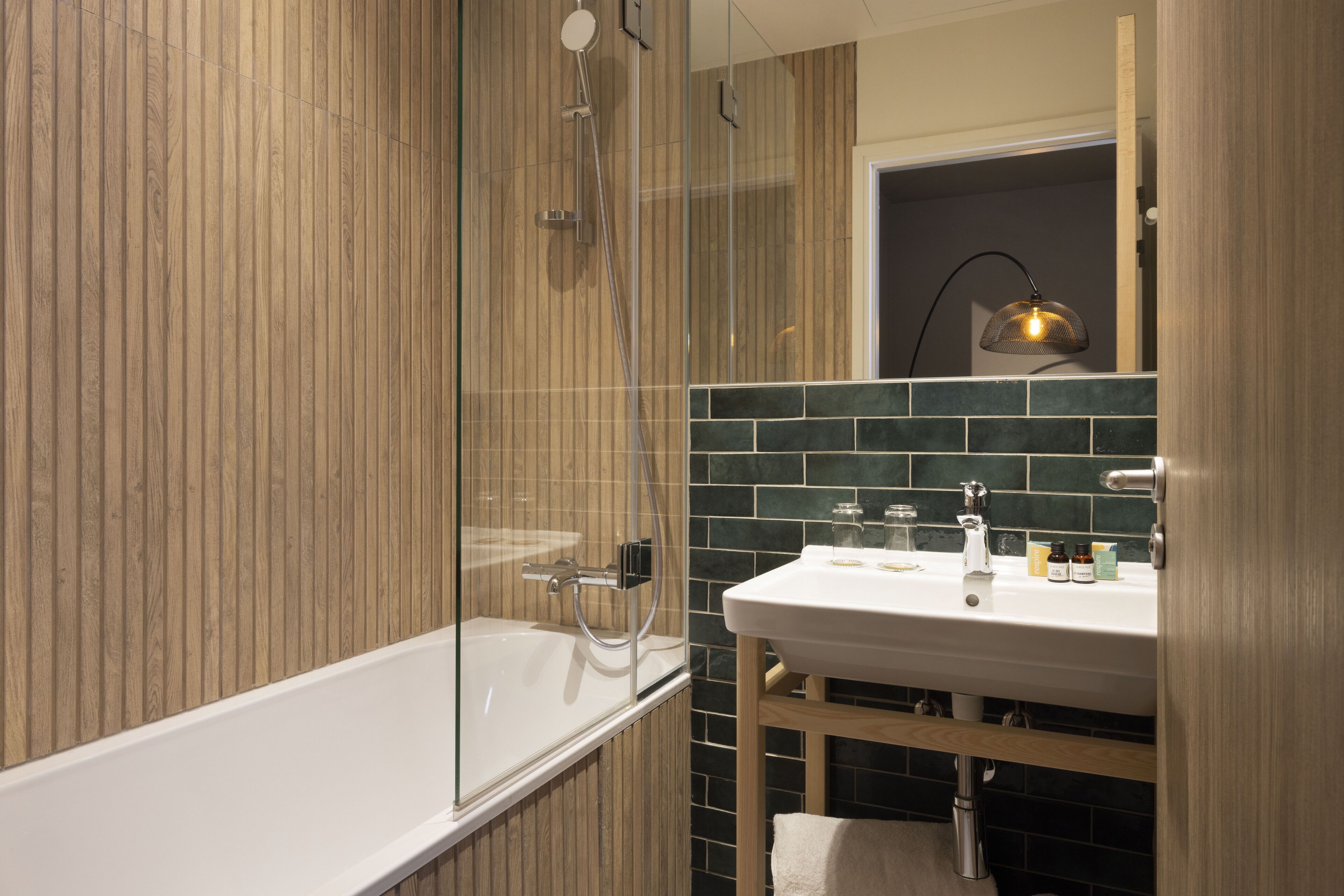 family suite, 2 bedrooms | bathroom | separate bathtub and shower, eco-friendly toiletries, hair dryer, towels