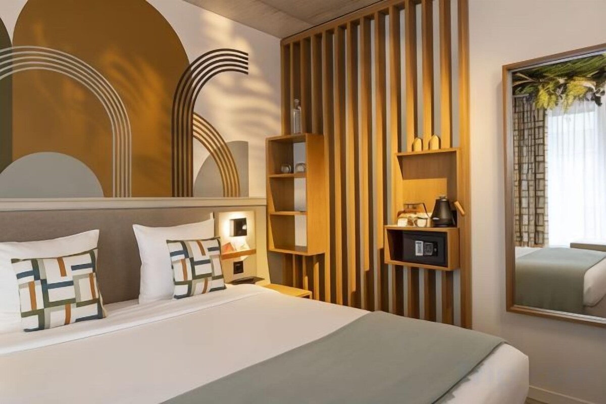 Luxe beddengoed, een kluis op de kamer, geluiddichte muren