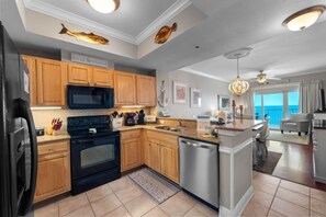 Coffee/tea maker, fridge, microwave, oven