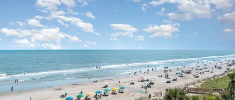 En la playa, toallas de playa