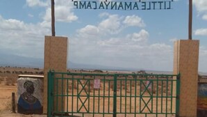 A gate with a sign reading "MAJAMAMALITTTI" and a camel statue above it. - Amanya Double Pitch Tent With Mt Kilimanjaro View (Amboseli)