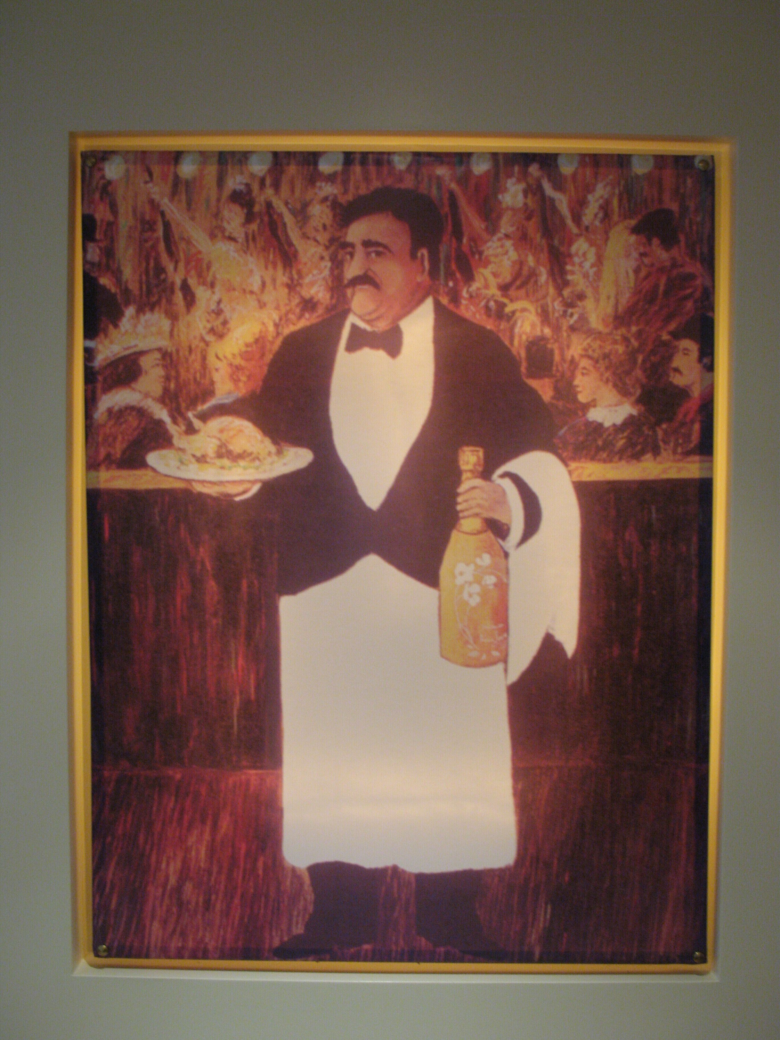 A framed artwork of a man in a tuxedo holding a plate and a bottle.