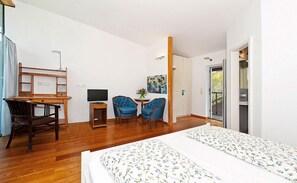 Chambre Double Confort | Coin séjour