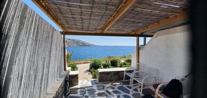 Terrace/patio - Amazing view of Ornos Bay in Mykonos (C869+V7P Mikonos, Greece)