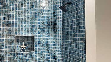 Bathtub, hair dryer, towels, soap