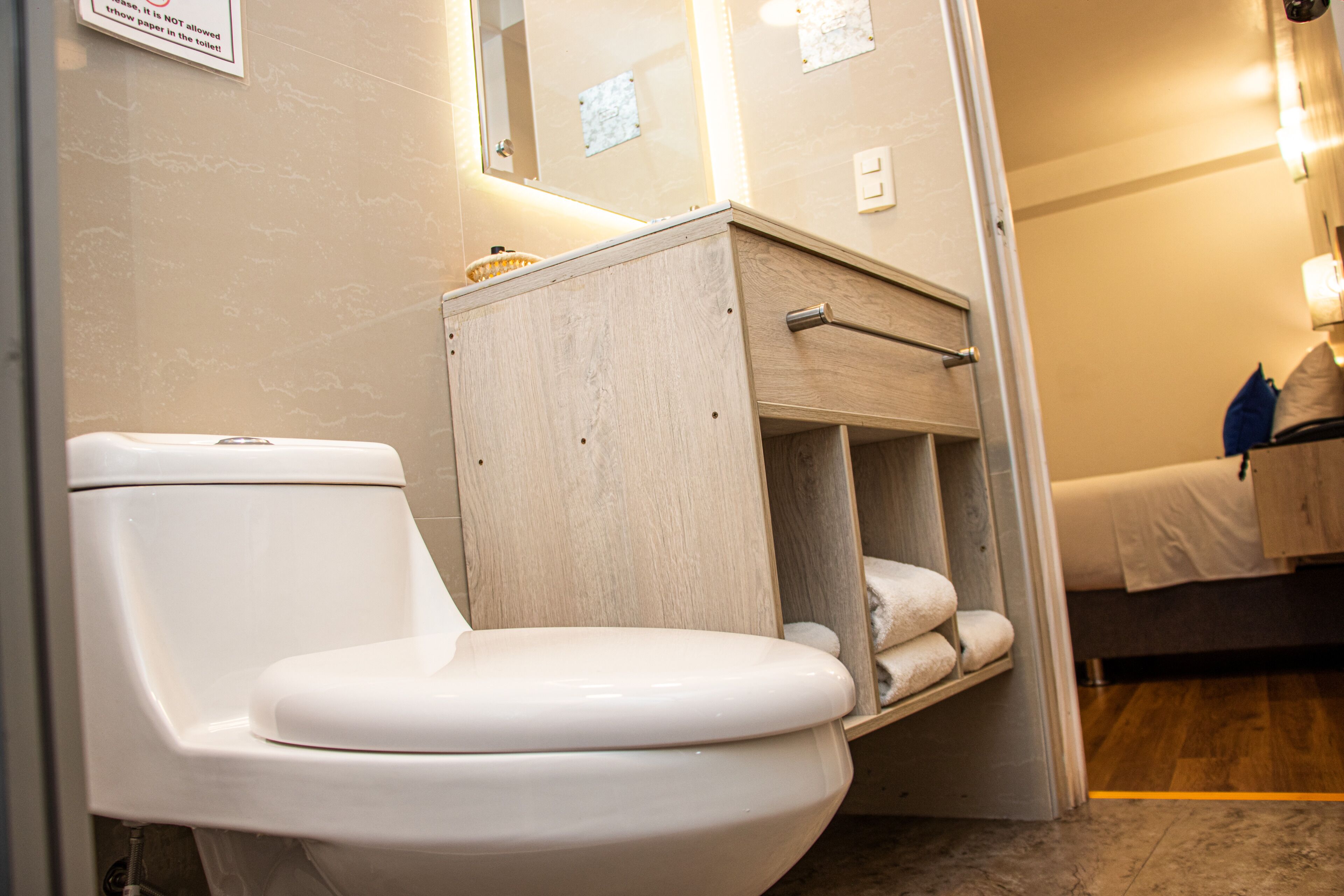 shower, designer toiletries, hair dryer, towels